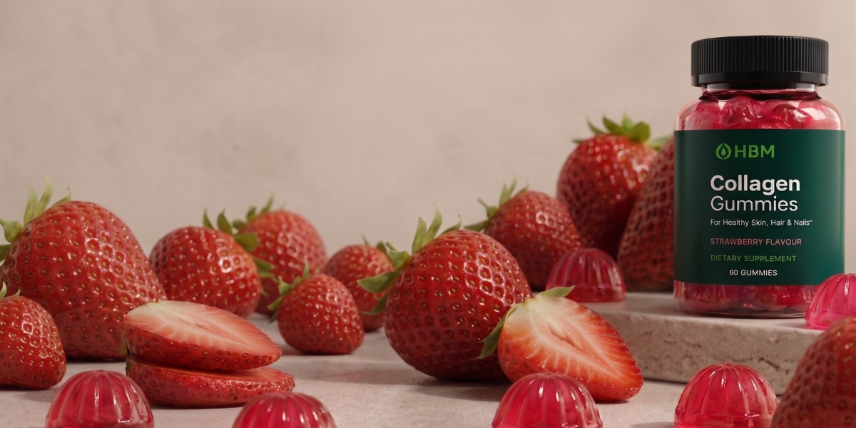 A high-quality product photograph of a bottle of green-labeled "Collagen Gummies" containing ingestible pink collagen gummies, surrounded by fresh whole and sliced strawberries to illustrate natural ingredients. This visual representation of a consumable supplement is part of a comparison discussion of collagen topical vs ingestible.